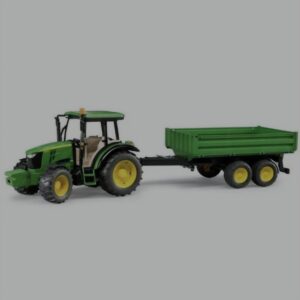 Modellino Bruder del trattore John Deere 5115M con rimorchio ribaltabile in scala 1:16 .